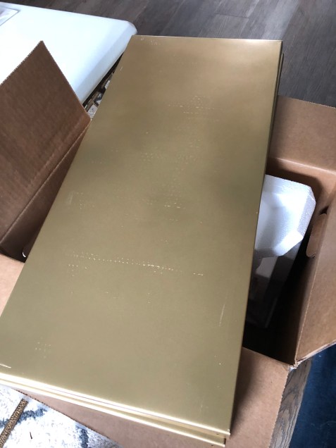 sprayed shelves gold